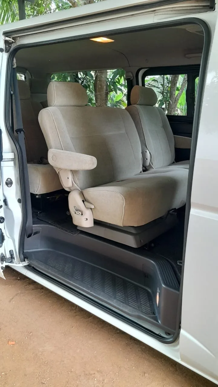 Comfortable seats inside a private passenger van